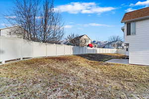 View of yard with a patio