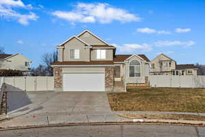 Front of property featuring a garage