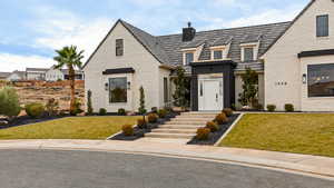 View of front of house featuring a front yard