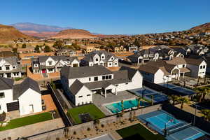 Birds eye view of property with a mountain view