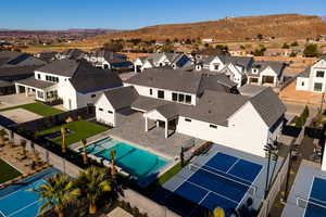 Birds eye view of property featuring a mountain view