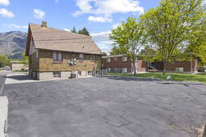 View of front of home featuring a mountain view