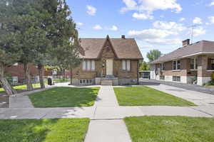 View of front of property with a front lawn