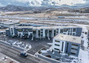 Snowy aerial view with a mountain view