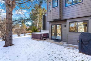 Exterior space featuring a hot tub