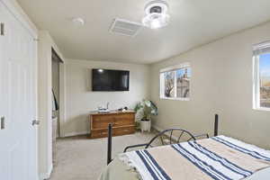 View of carpeted bedroom