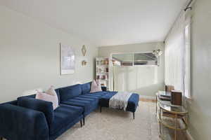 Living room with light wood-type flooring