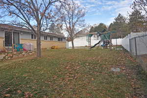 View of yard featuring a playground