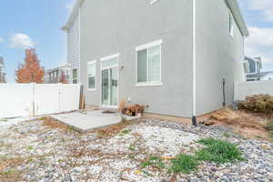 Back of property featuring a patio