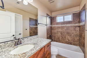 Main hall bathroom with tile tub/shower surround