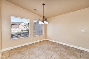 Large dining area with door to back patio