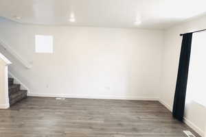 Interior space with hardwood / wood-style floors and plenty of natural light