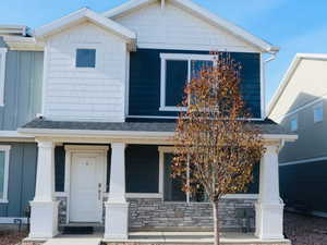 View of front of home with a porch