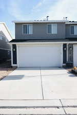 Front of property featuring a garage