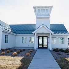 Entrance to clubhouse featuring french doors