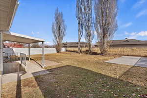 View of yard with a patio