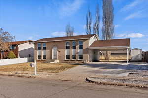 View of front facade featuring a carport