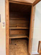 View of sauna / steam room with tile patterned flooring