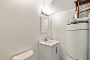 Bathroom with vanity and toilet