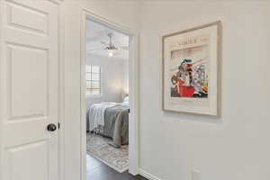 Hallway featuring dark hardwood / wood-style floors