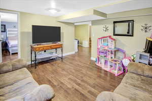 Living room featuring hardwood / wood-style floors