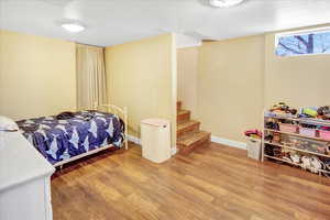 Bedroom featuring hardwood / wood-style flooring