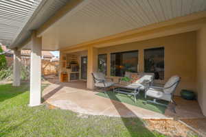 View of patio with area for grilling and grilling area