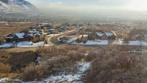 Snowy aerial view with a mountain view