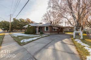 View of front of home with a carport