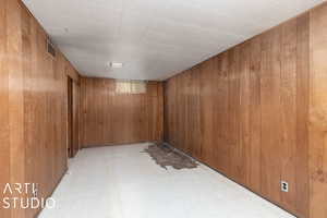 Basement with wooden walls