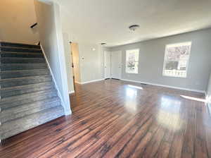 Interior space featuring dark hardwood / wood-style floors