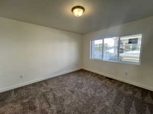 View of carpeted spare room