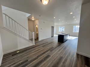 Interior space featuring dark hardwood / wood-style flooring and sink