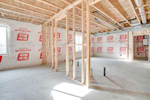 Below grade area featuring healthy amount of natural light and water heater