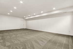 View of carpeted spare room