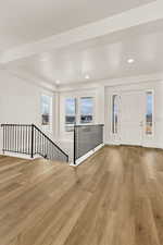 Entrance foyer featuring light hardwood / wood-style flooring