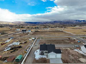 Drone / aerial view featuring a mountain view