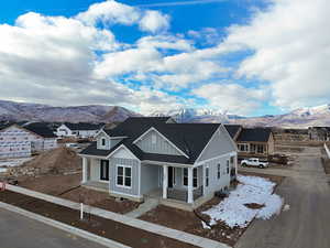 View of front of home featuring a mountain view