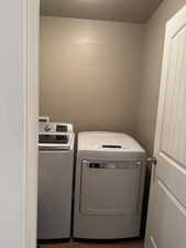 Laundry area featuring separate washer and dryer