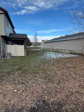 View of yard with central air condition unit