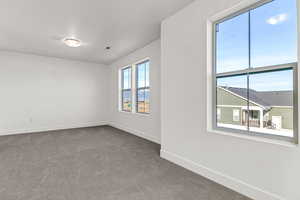 View of carpeted spare room