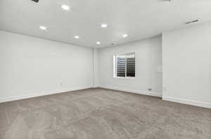 Spare room with carpet flooring