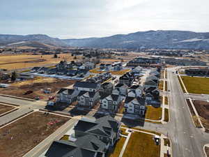 Birds eye view of property with a mountain view