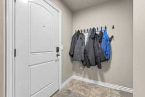 Entryway featuring light tile patterned flooring