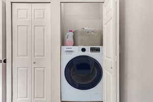 Laundry area featuring washer / dryer