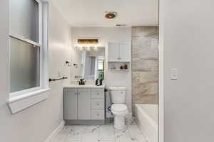 Bathroom with vanity and toilet