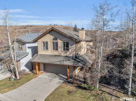 View of front of property featuring a garage