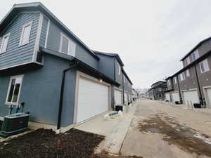 View of back of building-no parking on the short driveway or the community street