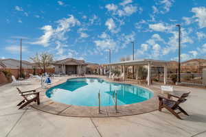 View of swimming pool with a patio