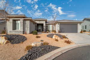 View of front of home with a garage